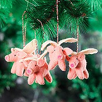 Wool felt ornaments, 'When Pigs Fly' (set of 4) - Set of 4 Handcrafted Wool Felt Pig Ornaments from India